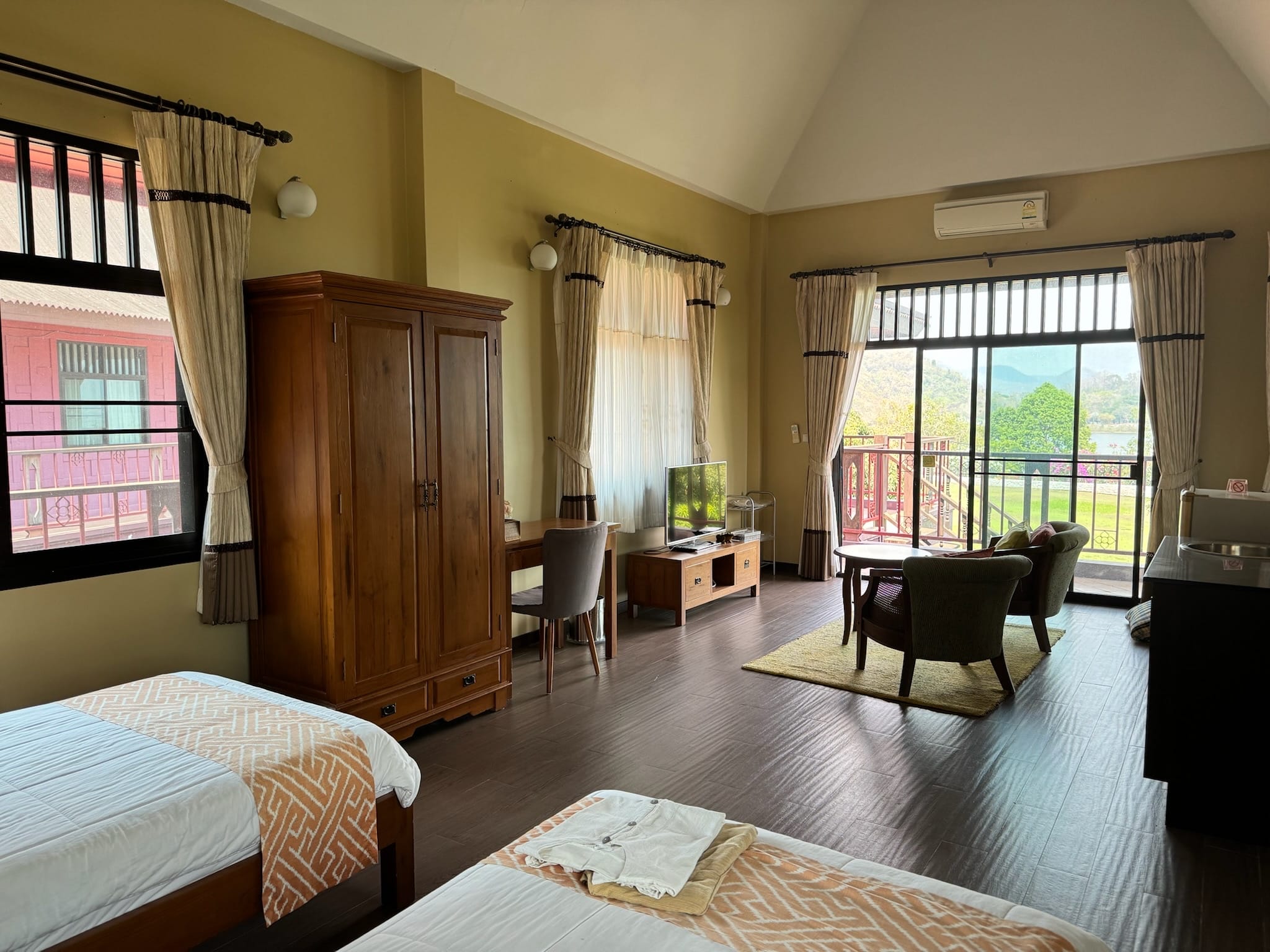 Bedroom balcony view over the lake and hills.